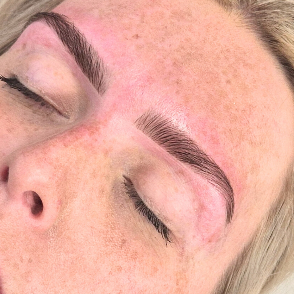 Client receiving the Definition Brow treatment at Nicola McLaughlin, showing shaped and tinted brows for a polished, natural look
